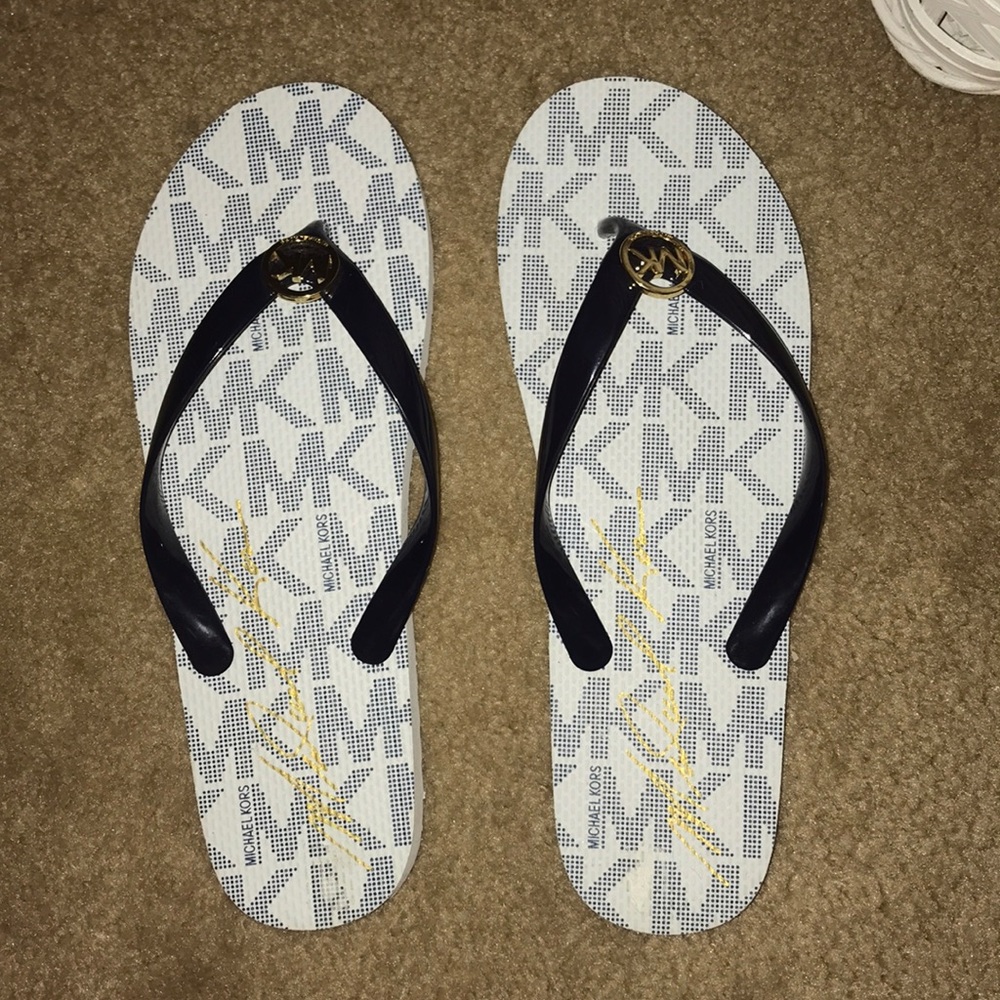Michael Kors Navy and white flip flops